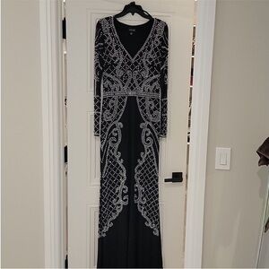 Xscape Black and Silver Long Sleeve Gown